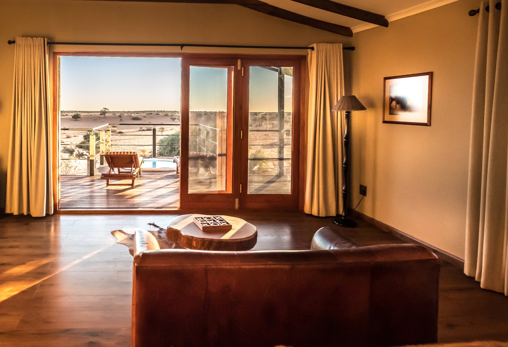 Bagatelle Lodge - Kalahari Game Ranch - Namibia - Guest room lounge with view